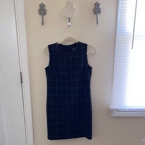 Black checkered work dress with leather detailing